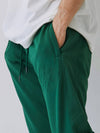 LOGO FREESTYLE SLIM SWEAT PANTS / GREEN